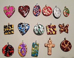 Eggshell covered pendants drizzled with colorful alcohol ink and/or acrylic paint.