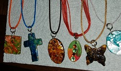 Necklaces with pieces and crushed eggshells.