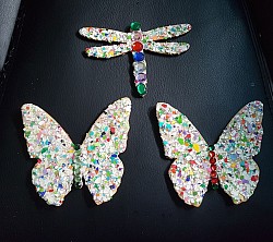 Wood butterfly and dragonfly pieces with painted crushed eggshells